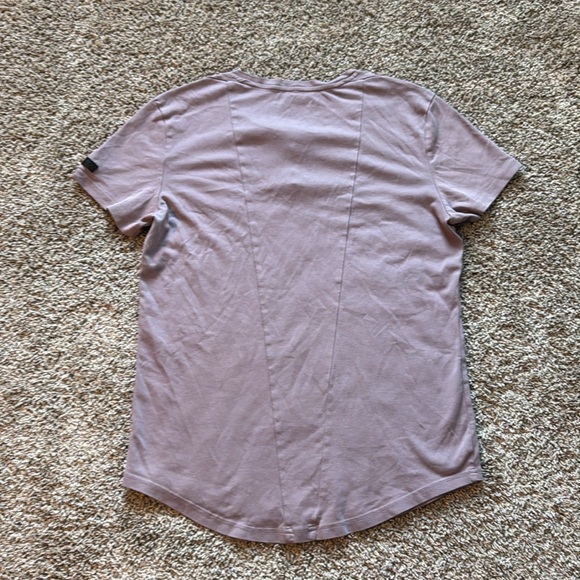 Alphalete Lux short sleeve henley style tee in a dusty lavender color - Picture 7 of 12